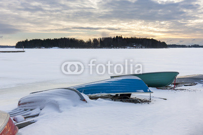 Colorful boats in harbor at winter
