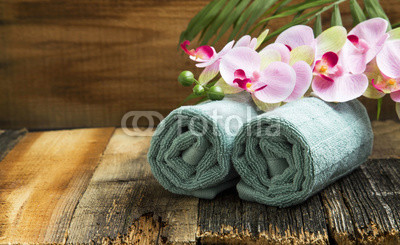 Spa still life with orchid flowers and soft towels