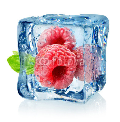 Ice cube and raspberries isolated