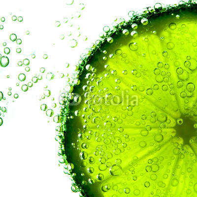 lime with bubbles isolated on white