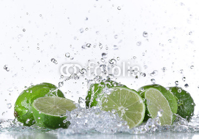Limes with water splash