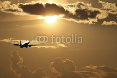 Silhouette of airplane with a beautiful sky