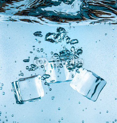 Ice cubes falling under water