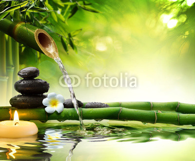 spa stones in garden with flow water