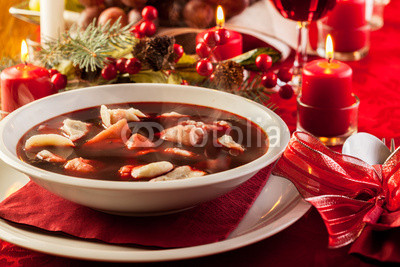 Christmas red borscht with meat filled dumplings