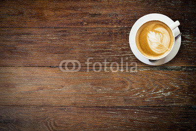 latte coffee on wood with space.