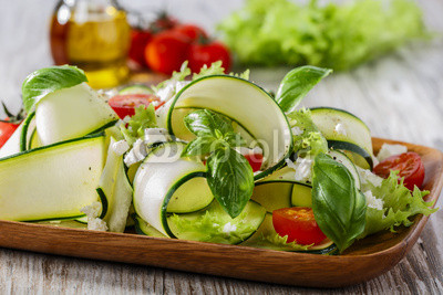 Zucchini salad with tomatoes and cheese
