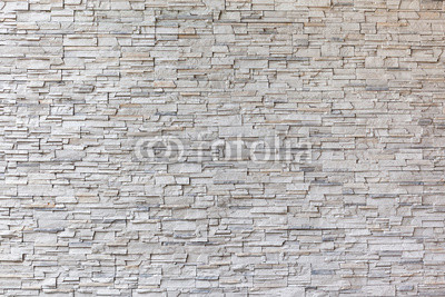 The exterior granite brick wall building.