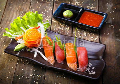 Japanese Salmon, tuna sushi and sauce closeup