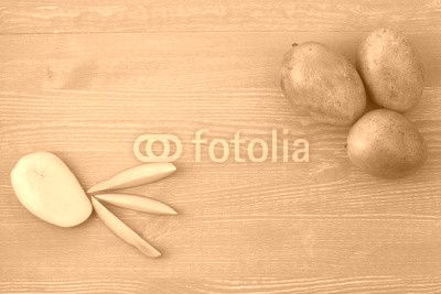 Three fresh mango and slices on a blue wooden background.