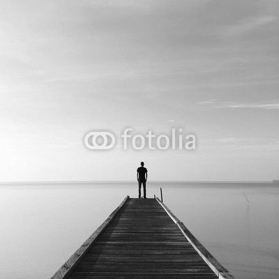 people standing on jetty