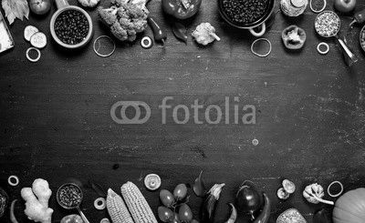 Frame of organic food. Fresh raw vegetables with black beans.