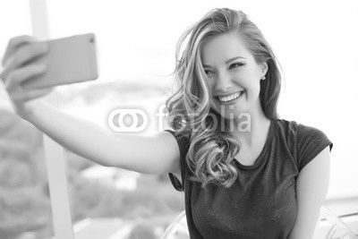 Woman doing selfie phone 