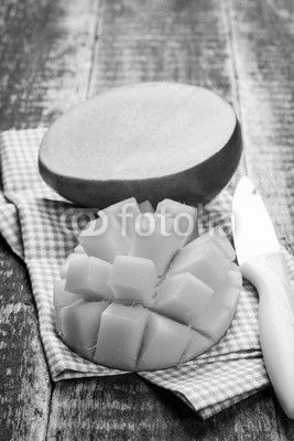 Fresh rip mango on a wooden background.Healthy food