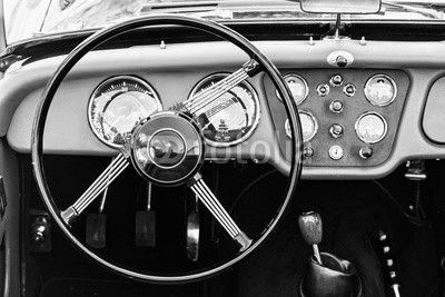 Steering wheel and dashboard in historic vintage car