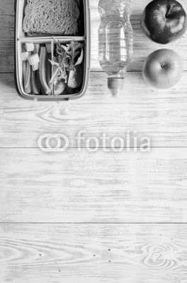 kid menu lunchbox for school top view on wooden background