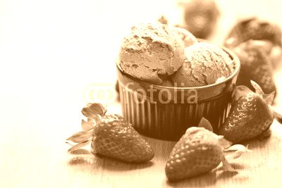 Strawberries and ice cream in a bowl