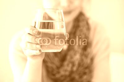 Young woman drinking water