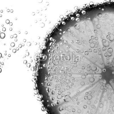 lime with bubbles isolated on white