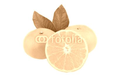Orange fruit with half and leaves isolated on white background