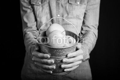 apples bucket in hands - vegetarian and vegan people