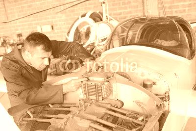 Mechanic working on aircraft
