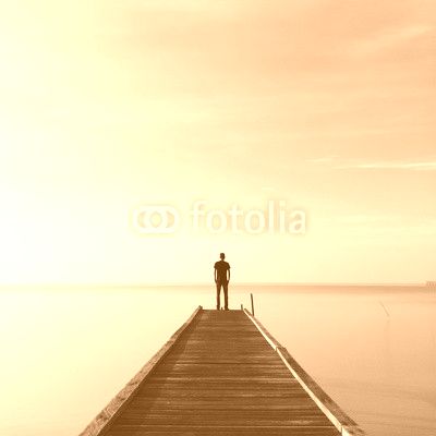 people standing on jetty