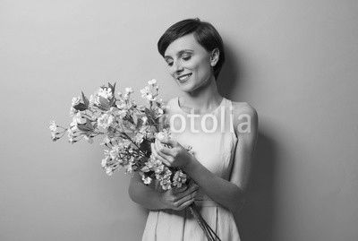 Bunch of flowers delighted woman