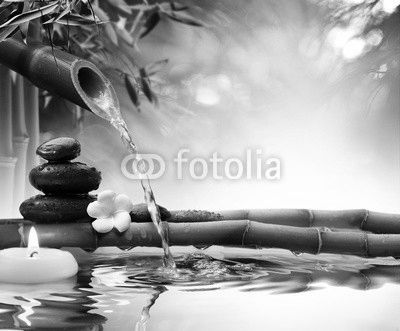 spa stones in garden with flow water