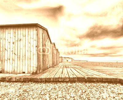 Wooden cabins along a beautiful beach