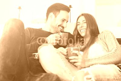 Happy young couple at home