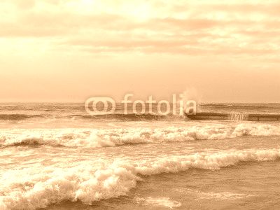 Winter storm at the Black sea, waves splashing on the pier