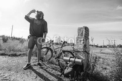 man drinks water on a halt