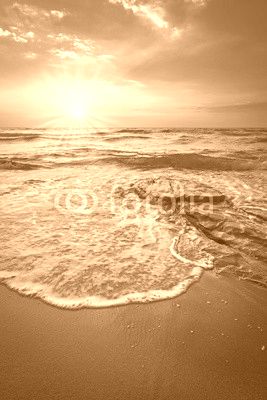 Sunray over sea in Tuscany