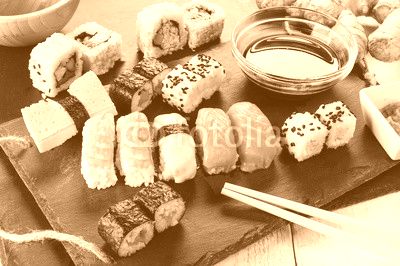 Slate tray of assorted sushi