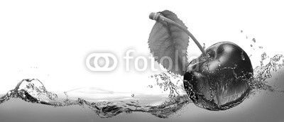 Juicy cherry berry in a spray of cool water.
