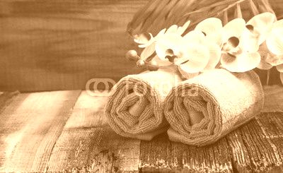 Spa still life with orchid flowers and soft towels