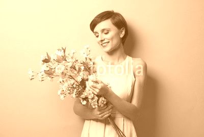 Bunch of flowers delighted woman