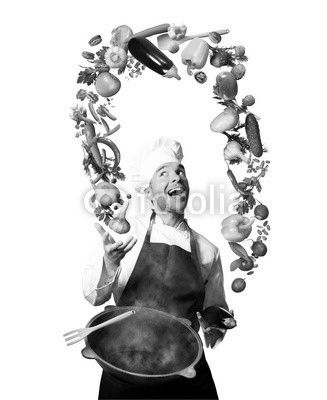 Chef juggling with vegetables and other food in the kitchen