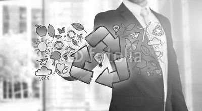 Businessman touching ecology interface with arrow recycling logo