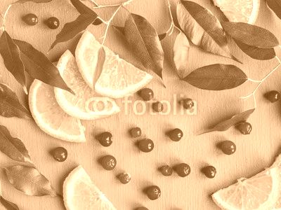 Fruit background design of citrus slices and cranberries. Fruit pattern.