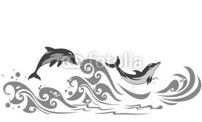 Dolphins jumping in sea waves