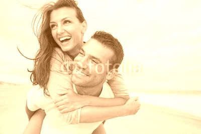 portrait of living young couple at the beach