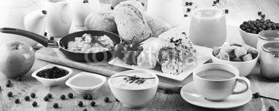 Breakfast served with coffee, cheese, cereals and scrambled eggs