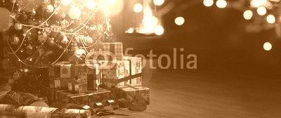 Christmas tree and holidays present on fireplace background