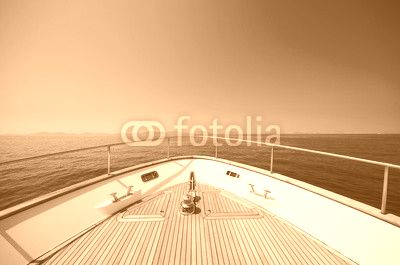 Wide angle shot of front of the yacht in summer time