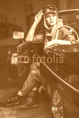 Audrey in an old car