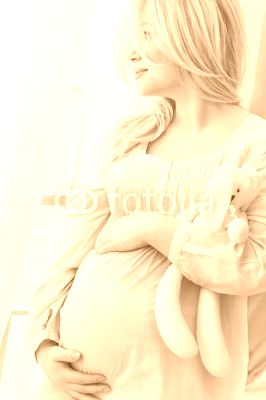 Portrait of the young pregnant woman