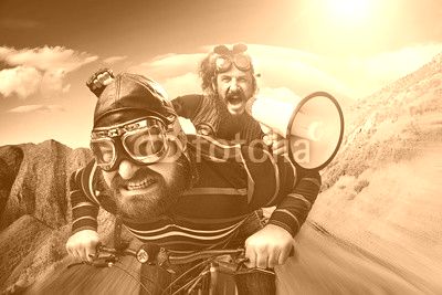 Funny portrait of a tandem of cyclists